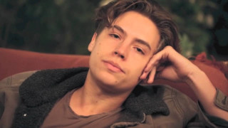 Man sitting couch hand head - attractive free wallpaper