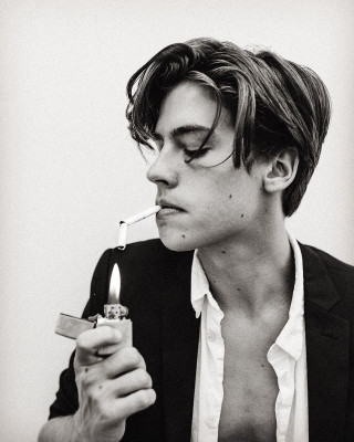 Man smoking cigarette lighter mouth - free vintage wallpaper