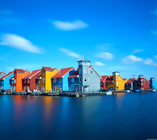 Houses pier water blue sky - arie smit free wallpaper