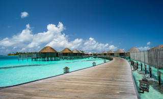 Wooden pier beach thatched huts - hut free wallpaper