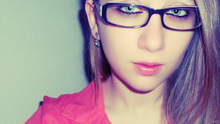 Woman glasses pink shirt ponytail - a pink shirt free wallpaper