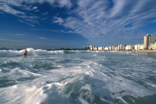 Person ocean city waves sunny - free ship wallpaper