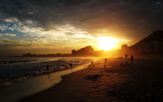 Beach sunset group walking people - sunset free wallpaper