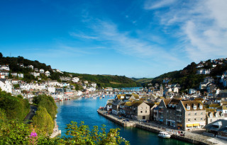 River houses hill background blue - a hill in the background free wallpaper