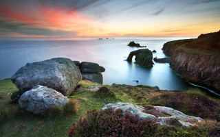 Rocky shore water rock formation - a rocky shore free wallpaper