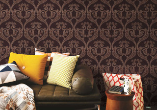Couch pillows blanket patterned wall - it in front free wallpaper