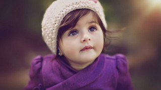 Little girl knitted hat purple - a little girl free wallpaper