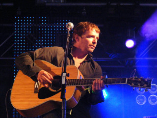 Man playing guitar concert stage 2 - a guitar free wallpaper