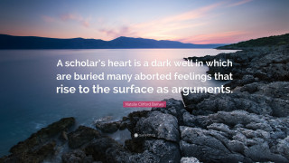 Rocky shore sunset quote heart - a sunset in the background and a quote free wallpaper