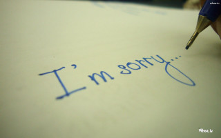 Person writing sorry note - sorry free wallpaper