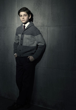 Young boy sweater tie hands - a wall free wallpaper