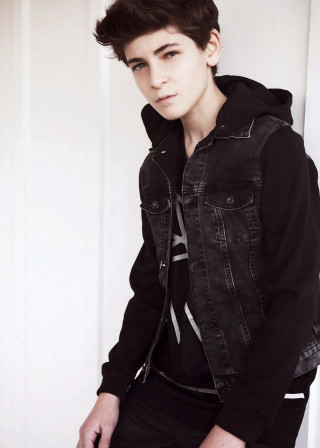 Young man black jacket leaning - young free wallpaper