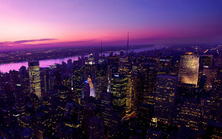 City skyline night purple water - a purple sky and water free wallpaper