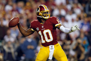 Man uniform holding football crowd 2 - a football free wallpaper