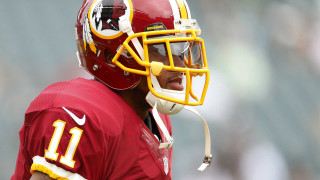 Football player helmet uniform closeup - a number free wallpaper