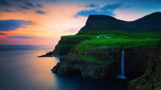 Waterfall body water cliff house - a green field below free wallpaper