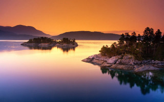 Sunset lake island trees shore - a small island in the middle of it free wallpaper
