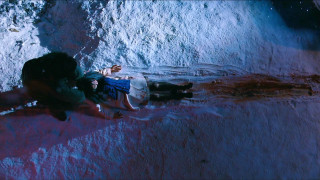 Man laying snow pile snowboard - movie scene free wallpaper