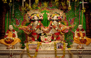 Statue deities temple flowers green - a statue free wallpaper