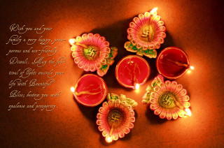 Lit diya poem candle table - a photo free wallpaper