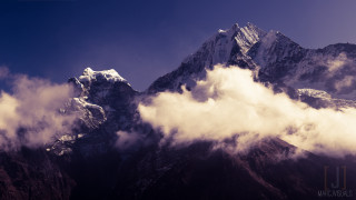 Mountain clouds snow sunny day - a sunny day free wallpaper