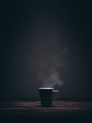 Steaming cup coffee table dark - volumetric lighting free wallpaper