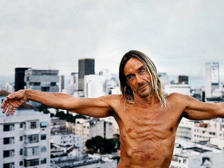 Man arms spread city skyline - david lachapelle free wallpaper