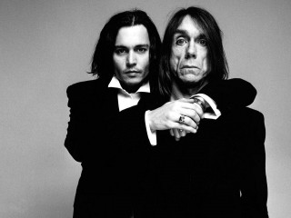 Two men black suits posing - a suit free wallpaper