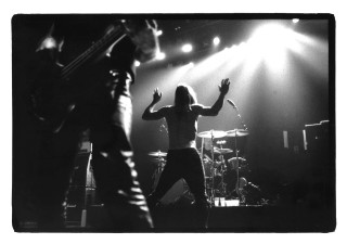 Man stage arms guitar band - godray free wallpaper