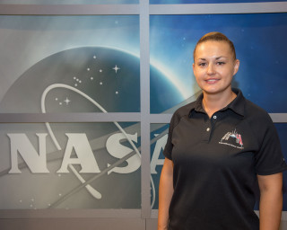 Woman nasa logo wall side - free space wallpaper