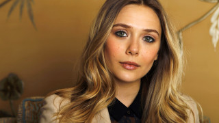 Woman long hair suit jacket - a wall in the background free wallpaper