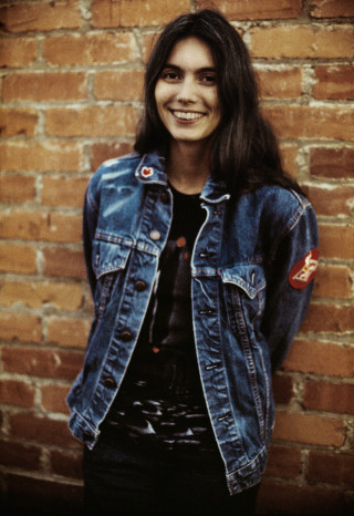 Woman brick wall jean jacket - barbara nessim free wallpaper