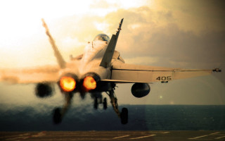 Fighter jet takeoff ship ocean 2 - a sunset in the background free wallpaper