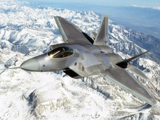Fighter jet mountain snowy sky - over a mountain range in the sky free wallpaper