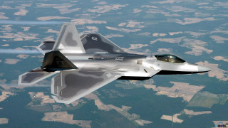 Jet flying lush green field 2 - ray free wallpaper