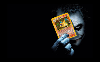 Man holding card creepy face - the gathering free wallpaper
