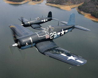 Small plane lake sky shoreline - over a lake free wallpaper