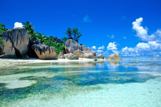 Beach rocks clear water blue 2 - rock free wallpaper