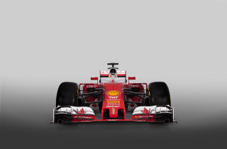 Red race car front wheel - a red race car free wallpaper