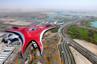 Red white building highway river - aerial free wallpaper