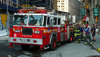 Fire truck parked street people - a fire truck free wallpaper