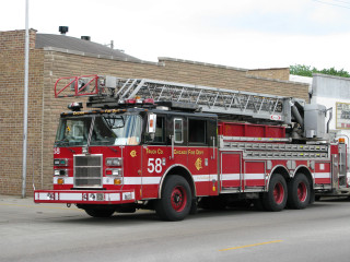 Fire truck brick building ladder - a fire truck free wallpaper