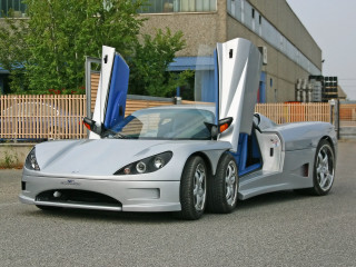 Silver sports car open urban - f 8 aperture free wallpaper