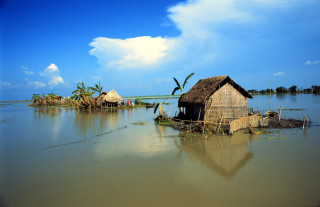 Hut lake people surrounding side - a few person free wallpaper
