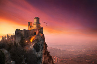 Castle hill sunset birds flying 2 - a sunset in the background and birds free wallpaper