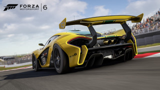 Yellow sports car race track 10 - the stand behind free wallpaper