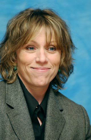 Woman suit tie smiling picture - a suit free wallpaper