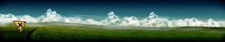 Grassy field sign mountain cloudy - a grassy field free wallpaper
