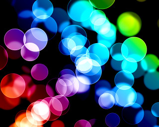 Blurry black background multicolored circle - a blurry photo free wallpaper
