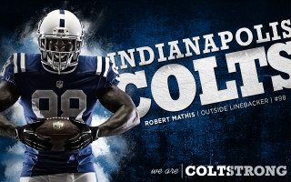 Football player holding ball indianapolis - a football player holding free wallpaper